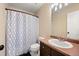 Simple bathroom with shower/tub combo and dark vanity at 600 Balsa Dr, Castle Rock, CO 80104