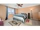 Spacious bedroom with ceiling fan and window at 600 Balsa Dr, Castle Rock, CO 80104