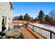 Large deck with firepit and views of backyard at 600 Balsa Dr, Castle Rock, CO 80104