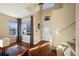 Bright entryway with hardwood floors and staircase at 600 Balsa Dr, Castle Rock, CO 80104