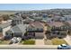 Expansive aerial view of a neighborhood showcasing well-maintained homes and landscaping at 7812 Blue Water Ln, Castle Rock, CO 80108