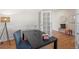 Home office with stylish decor, bright light and modern furnishings at 7812 Blue Water Ln, Castle Rock, CO 80108