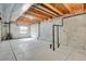 Unfinished basement with concrete walls and floor at 9690 Lansing Cir, Commerce City, CO 80022