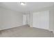 Comfortable bedroom with carpeting, a closet, and a door to the hallway at 9690 Lansing Cir, Commerce City, CO 80022