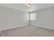 Well-lit bedroom with carpet flooring, neutral walls, and a window with blinds at 9690 Lansing Cir, Commerce City, CO 80022