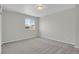 Neutral bedroom with a window and carpet at 9690 Lansing Cir, Commerce City, CO 80022