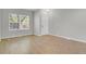 Inviting living room featuring new vinyl floors, neutral paint, and ample natural light at 9690 Lansing Cir, Commerce City, CO 80022