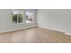Spacious living room with new vinyl floors, perfect for entertaining at 9690 Lansing Cir, Commerce City, CO 80022