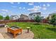 Large backyard featuring a gravel bed and planter, ideal for gardening and enjoying the outdoors at 25850 E 3Rd Ave, Aurora, CO 80018