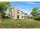 Expansive backyard featuring a well-manicured lawn, a patio area, and a privacy fence at 5991 W 68Th Ave, Arvada, CO 80003