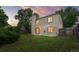 Spacious backyard with a lush lawn, a patio, and a charming pergola, perfect for outdoor enjoyment at 5991 W 68Th Ave, Arvada, CO 80003