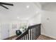 Inviting foyer with hardwood floors, vaulted ceiling, and views to the living room at 5991 W 68Th Ave, Arvada, CO 80003