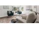 Bright living room with bay window, comfortable seating, and stylish rug at 5991 W 68Th Ave, Arvada, CO 80003