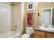 This bright bathroom features a tub, shower and vanity at 1038 Petras St, Erie, CO 80516