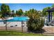 Community pool surrounded by lush greenery and seating areas, perfect for relaxation at 1038 Petras St, Erie, CO 80516