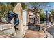 A street view featuring a unique horse sculpture and nearby buildings at 1038 Petras St, Erie, CO 80516