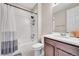 Bathroom featuring tile floors, a vanity with sink, and a shower and tub combination at 4733 S Wenatchee Cir, Aurora, CO 80015