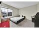 This bedroom features a window with a view of the neighborhood at 4733 S Wenatchee Cir, Aurora, CO 80015