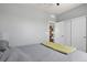 Bedroom featuring neutral walls, plush carpet, and a closet for storage at 1794 Wright Dr, Erie, CO 80516
