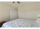 Bedroom with a bed, closet, and neutral-toned walls at 1794 Wright Dr, Erie, CO 80516