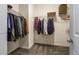 Walk-in closet with shelving for optimal organization of clothes, luggage, and accessories at 1794 Wright Dr, Erie, CO 80516