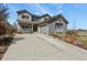 Charming two-story home featuring a covered porch, manicured landscaping, and an attached two-car garage at 1794 Wright Dr, Erie, CO 80516