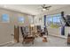 Upstairs loft area with comfortable seating, telescope, and view of neighborhood at 1794 Wright Dr, Erie, CO 80516