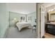 A quaint bedroom features a connecting door to the en suite bathroom at 4829 Baldwin Pl, Boulder, CO 80301
