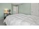 This bedroom offers neutral paint and carpet with connecting bath at 4829 Baldwin Pl, Boulder, CO 80301