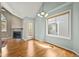 Open dining room with wood-look floors, fireplace, and backyard access at 4829 Baldwin Pl, Boulder, CO 80301