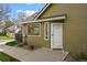 Home featuring a front door with good natural light and surrounding landscaping at 4829 Baldwin Pl, Boulder, CO 80301