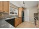 Bright kitchen featuring wood cabinets and modern appliances at 4829 Baldwin Pl, Boulder, CO 80301