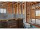 Unfinished bathroom with toilet, cabinets, and exposed framing at 17155 Primrose Ln, Mead, CO 80542