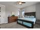 Spacious bedroom with a king-size bed and dresser at 17155 Primrose Ln, Mead, CO 80542