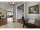 Open concept entryway with views to living room and fireplace at 17155 Primrose Ln, Mead, CO 80542