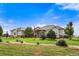 Spacious single-story home with well-manicured lawn and landscaping at 17155 Primrose Ln, Mead, CO 80542