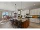 Spacious kitchen with island, stainless steel appliances, and ample cabinet storage at 17155 Primrose Ln, Mead, CO 80542