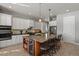 Gourmet kitchen boasts double ovens, granite countertops, and an island at 17155 Primrose Ln, Mead, CO 80542