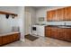 Convenient laundry room with washer, dryer, and built-in storage at 17155 Primrose Ln, Mead, CO 80542