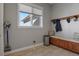 Mudroom with built-in bench, hooks, and ample storage at 17155 Primrose Ln, Mead, CO 80542