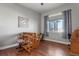 Home office with hardwood floors and large window at 17155 Primrose Ln, Mead, CO 80542