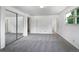 The primary bedroom features neutral carpet, ample closet space, and natural light at 10371 Monterey Cir, Northglenn, CO 80260