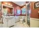 Well-maintained bathroom featuring a walk-in shower and a vanity with ample storage at 13 Wedge Way, Littleton, CO 80123