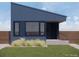 New construction home with modern architecture, neutral paint and minimalistic landscaping at 410 Bountiful Ave, Longmont, CO 80501