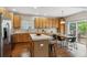 Spacious kitchen with an island, hardwood floors, and lots of cabinet space at 6519 Eastview St, Longmont, CO 80504