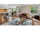 Inviting living room with a fireplace, hardwood floors, and plenty of natural light at 6519 Eastview St, Longmont, CO 80504