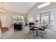 Bright, modern living room with high ceilings, a bay window, and stylish furniture at 6519 Eastview St, Longmont, CO 80504