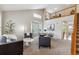 Spacious living room with high ceilings, ample natural light, and contemporary furnishings at 6519 Eastview St, Longmont, CO 80504