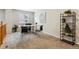 Upstairs office space with natural light, carpet floors, and modern desk setup at 6519 Eastview St, Longmont, CO 80504