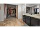 Bathroom featuring a vanity, mirror, and closet at 7829 Nile Cir, Arvada, CO 80007